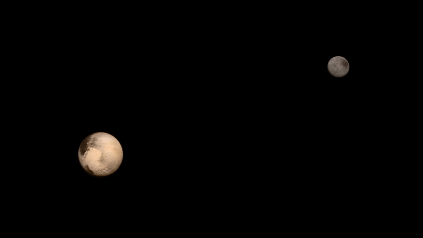 Pluto and its large moon Charon as seen by New Horizons in 2015.