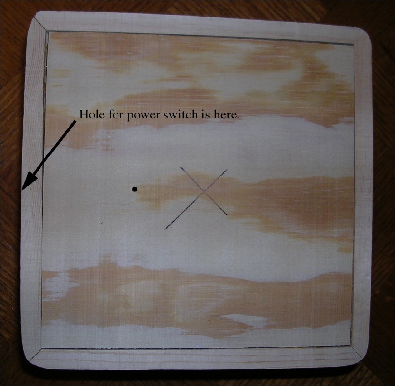 Two points are marked on the top base board.