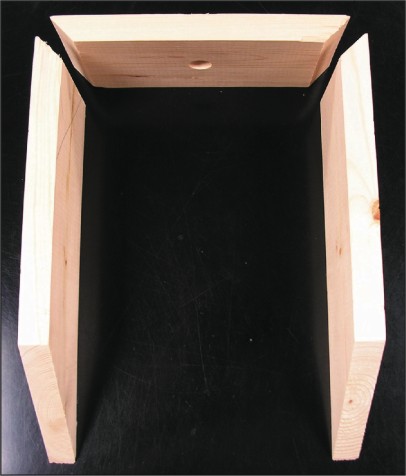 The three sections of the base, prior to joining, showing the correct miter cuts.
